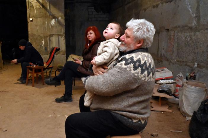 Ukrainians in the eastern city of Kharkiv take shelter in a basement on Sunday. The city, which is close to the Russian border, has been hard hit throughout the Russian invasion. Residents are bracing for a new Russian offensive in the eastern part of Ukraine.
