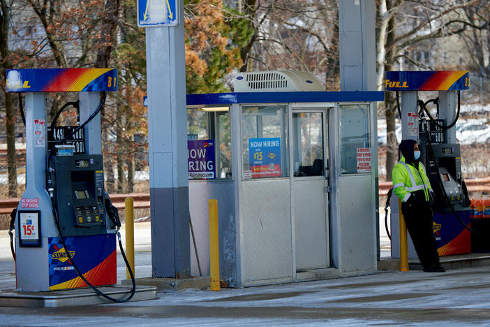 An attendant at a Sunoco gas station in Bloomfield, New Jersey, U.S., on Sunday, March 13, 2022.