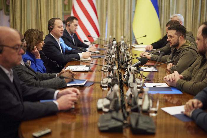 Ukrainian President Volodymyr Zelenskyy and U.S. Speaker of the House Nancy Pelosi, third from left, talk during their meeting in Kyiv on Saturday.