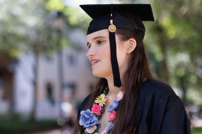 "God gave you a voice. Use it," Elizabeth Bonker told her fellow graduates. "And no, the irony of a nonspeaking autistic encouraging you to use your voice is not lost on me."
