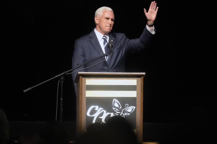 Former Vice President Mike Pence speaks at a fundraiser for Carolina Pregnancy Center on May 5 in Spartanburg, S.C. Pence will campaign with Georgia's incumbent Republican Gov. Brian Kemp the day before this month's GOP primary in his most significant political beak with former President Donald Trump to date.