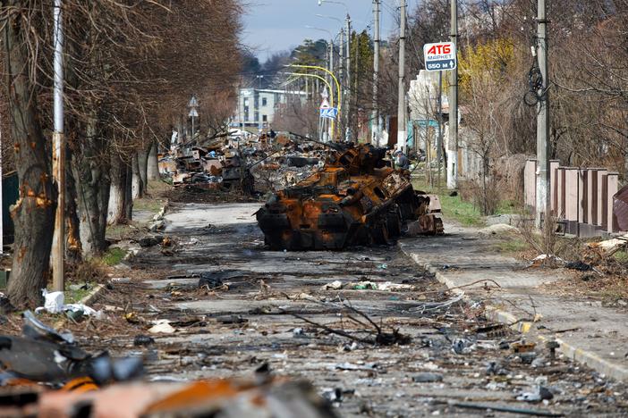 The devastation on Bucha's Vokzal'na Street in early April, just after the Russian troops left. The photo below shows the cleaned up street on Monday.