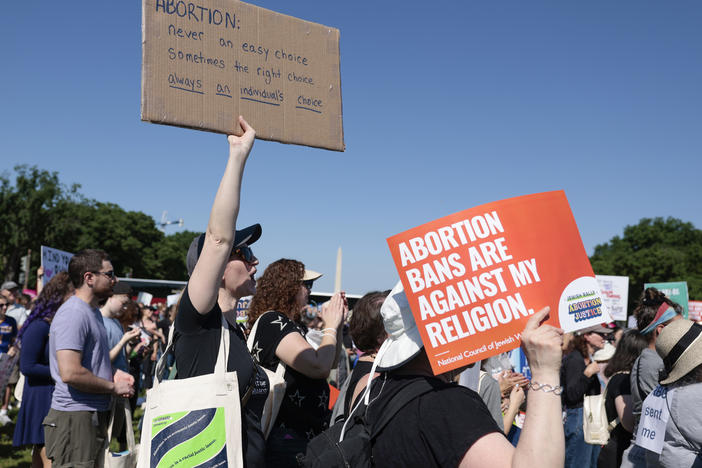 A protester carries a sign as they attend the "Jewish Rally for Abortion Justice" rally at Union Square near the U.S. Capitol on May 17.