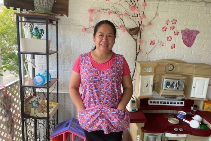 Damaris Mejia runs a childcare center out of her Washington, D.C., rowhouse. In an effort to stem a shortage of early educators, the city wants to boost their pay closer to that of public school teachers.