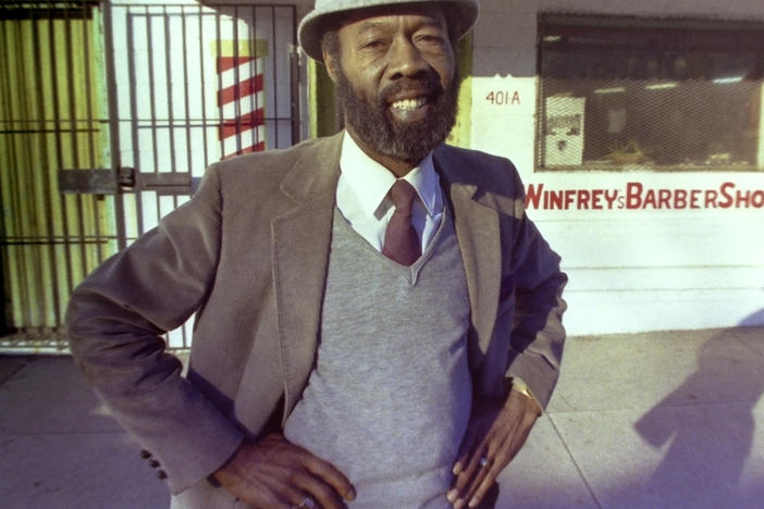 Vernon Winfrey, father of Oprah Winfrey, stands outside his barber shop in Nashville, Tenn., in 1987. Oprah Winfrey confirmed that her father died on Friday.