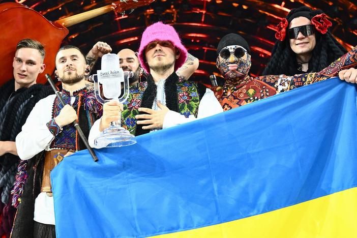 Members of the Ukrainian band Kalush Orchestra pose onstage after winning the Eurovision Song Contest on May 14 in Turin, Italy. The winning country typically hosts the next year's competition, but Russia's war in Ukraine has disrupted that tradition.