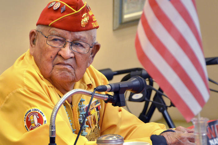 In this 2013 photo, Navajo Code Talker Samuel Sandoval talks about his experiences in the military. Sandoval, one of the last remaining Navajo Code Talkers who transmitted messages in World War II using a code based on their native language, has died at age 98.