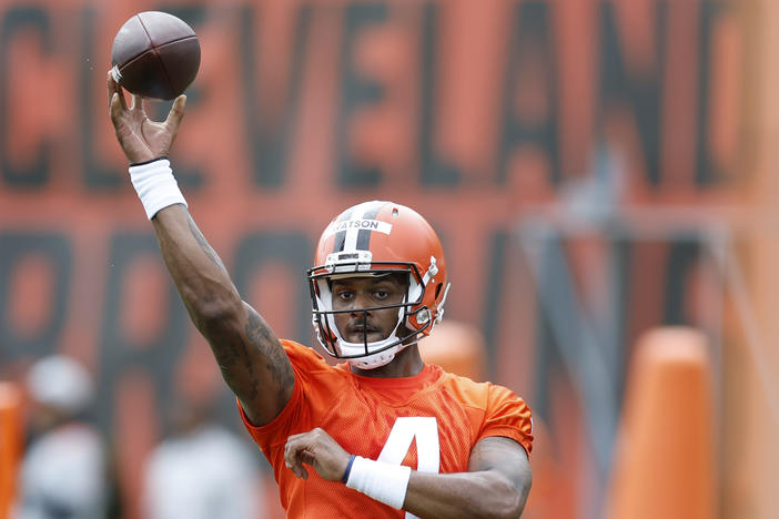 Cleveland Browns quarterback Deshaun Watson throws a pass during practice at the team's training facility in May in Ohio. The NFL suspended Watson for six games on Monday for violating its personal conduct policy following accusations of sexual misconduct.