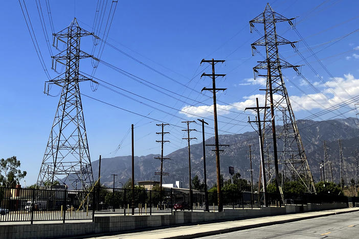 Electrical grid towers are seen during a heat wave where temperature reached 105 degrees Fahrenheit, in Pasadena, Calif. on Wednesday.