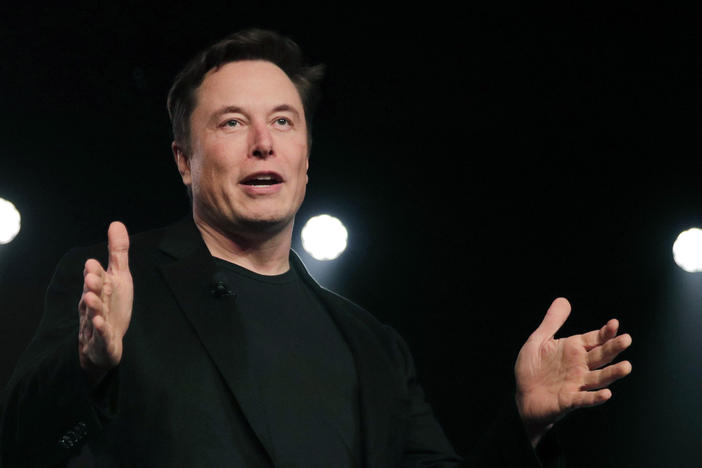 Tesla CEO Elon Musk speaks in March 2019 before unveiling the Model Y at Tesla's design studio in Hawthorne, Calif.. Musk's legal team is demanding to hear from a whistleblowing former Twitter executive who could help bolster Musk's case for backing out of a $44 billion deal to buy the social media company.