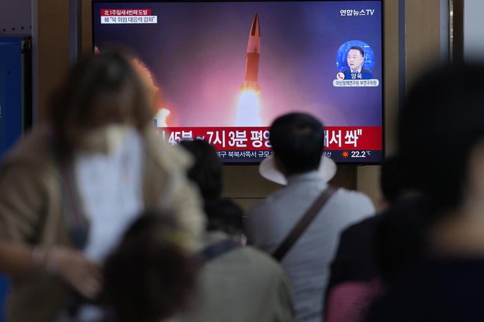 A TV screen showing a news program reporting about North Korea's missile launch with file imagery, is seen at the Seoul Railway Station in Seoul, South Korea, on Saturday.