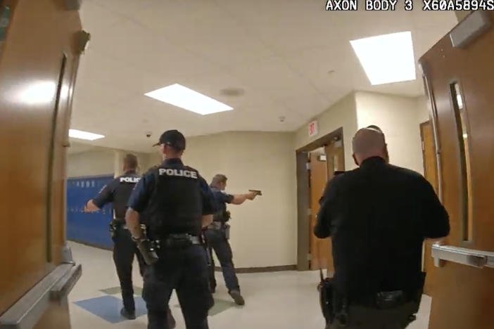 Police officers respond to a call that an active shooter had reportedly injured 24 students at Chillicothe High School in Chillicothe, Ohio, in September. The call turned out to be a hoax. Similar scenes have played out at schools across the country in recent weeks.