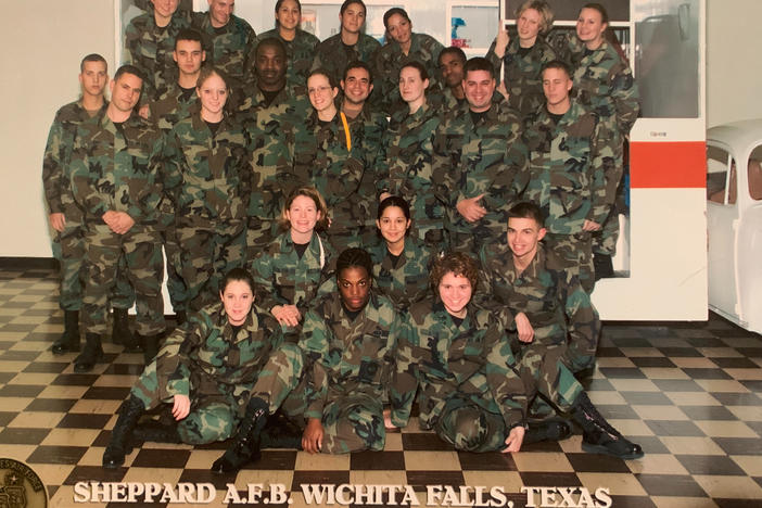 Jessica Israelsen (first from the left in the second row from bottom) in 2003, when she first joined the U.S. Air Force as a medical technician. In 2008, when she was struggling financially, her unit purchased Christmas gifts for her family.