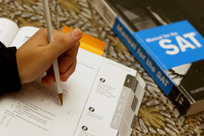 Suzane Nazir uses a Princeton Review SAT Preparation book to study for the test on March 6, 2014 in Pembroke Pines, Fla.