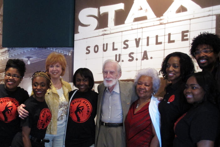Stax Records co-founder Jim Stewart (center) poses for a photo with friends and students of the Stax Music Academy on April 29, 2013, in Memphis, Tenn. Stewart died Monday at age 92.