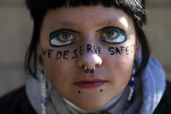 E.O., a sophomore at Ingraham high school is portrayed with the words 'we deserve safety' painted on their face during a student walkout to protest gun violence in schools on Monday, November 14, 2022, at Seattle City Hall. Full story <a href="https://www.kuow.org/stories/seattle-students-send-message-to-city-hall-in-wake-of-ingraham-shooting-5ba1">here</a>.