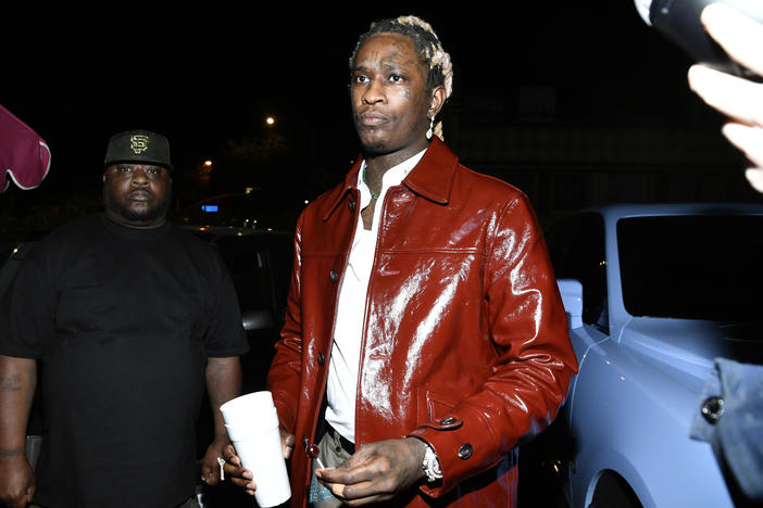 Rapper Young Thug is accused of helping found a violent street gang.