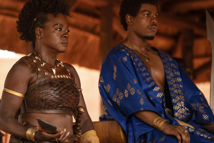 This image released by Sony Pictures shows Viola Davis, left, and John Boyega in "The Woman King." "Black Panther: Wakanda Forever" earned 12 NAACP Image Awards nominations on Thursday, Jan. 12, 2023, while "The Woman King" and "Abbott Elementary" will enter next month's ceremony as top nominees.