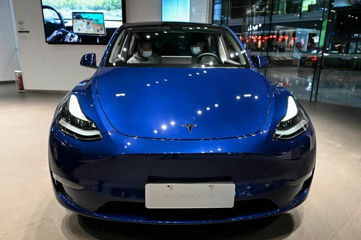 Tesla's Model Y is on display at a Tesla showroom in a shopping mall in Beijing on April 29, 2022. The electric car maker cut prices for its models in a bid to boost sales.