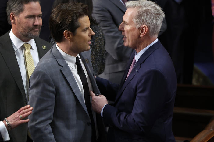 U.S. House Republican Leader Kevin McCarthy talks to then-Rep.-elect Matt Gaetz, R-Fla., in the House Chamber during the fourth day of voting for speaker of the House in January.