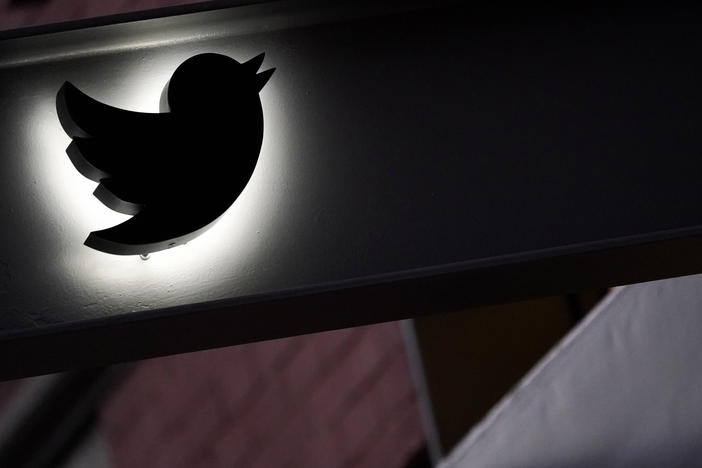 The Twitter logo is seen on the awning of the building that houses the Twitter office in New York on Oct. 26, 2022.