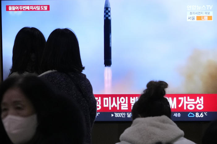 A TV screen shows a file image of North Korea's missile launch during a news program at a railway station in Seoul, South Korea, on Saturday.