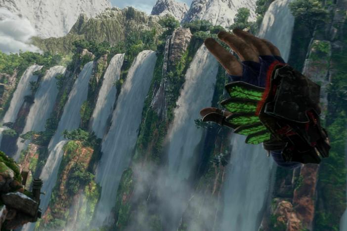 Scale fantastic scenery with disembodied hands in PS VR2's flagship launch game, <em>Horizon Call of the Mountain.</em>