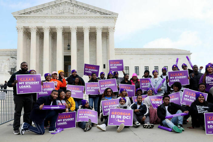 Student loan borrowers and advocates gather Tuesday for a rally during the Supreme Court's arguments on President Biden's student debt relief plan.