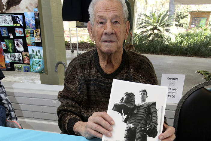 Ricou Browning, who played the creature in <em>Creature from the Black Lagoon</em>, poses for photos for people during Florida SpringsFest at Silver Springs State Park in Silver Springs, Fla., Sunday, March 4, 2018.