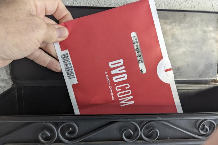 A Netflix DVD envelope is shown in 2022 in San Francisco. Netflix is poised to shut down its DVD-by-mail rental service.