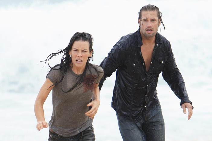 Series like <em>Lost</em> and <em>Westworld</em> were made for intense speculation and close audience attention. Above, Kate Austen (Evangeline Lilly) and James "Sawyer" Ford (Josh Holloway) in <em>Lost.</em>