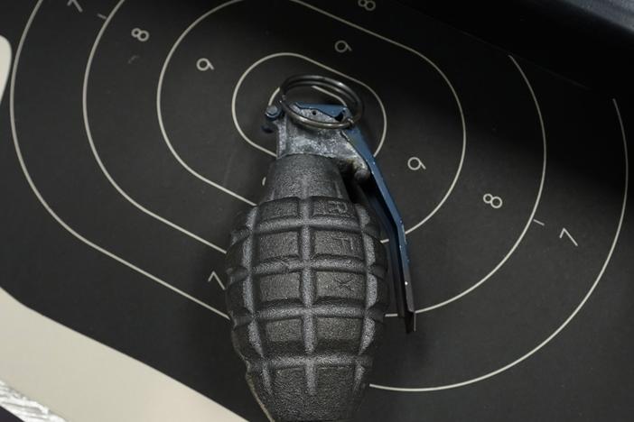 A grenade is on display at Jimmy's Sport Shop in Mineola, New York on September 25, 2020.