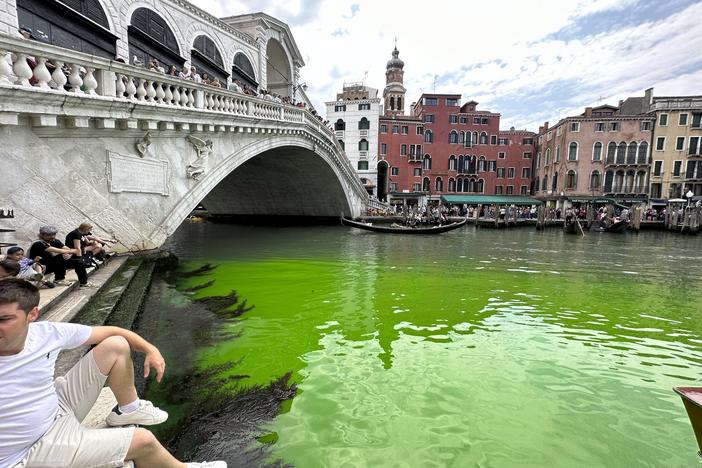 Police in Venice, Italy, are investigating the source of a bright green liquid patch that appeared on Sunday in the city's Grand Canal.