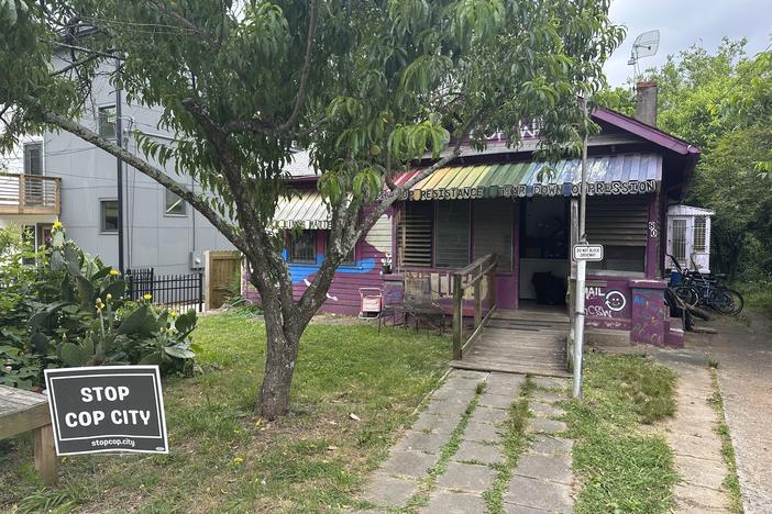 This house in Atlanta's Edgewood neighborhood is where police on Wednesday arrested three key organizers who have been aiding protesters against the city's proposed public safety training center. The three are officers of the group that runs the Atlanta Solidarity Fund, which has bailed out people arrested during protests against the project.