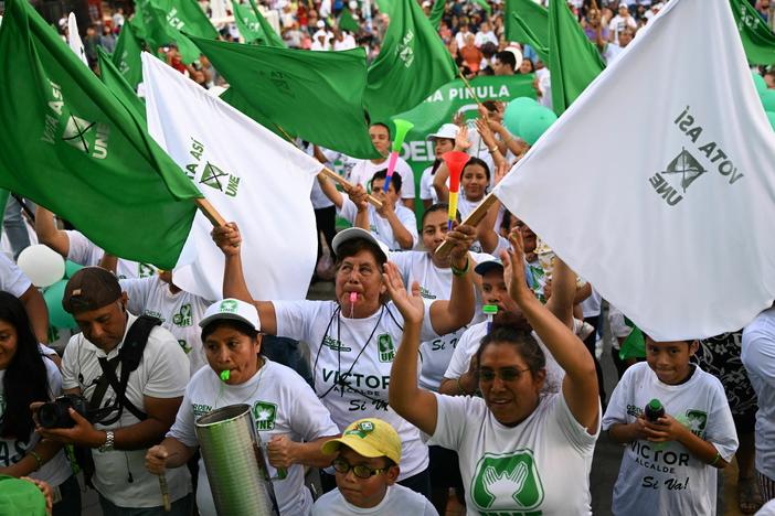 Supporters of Guatemalan candidate for the National Union of Hope party and former first lady, Sandra Torres, attend a campaign rally in Santa Catarina Pinula, Guatemala, on June 17.