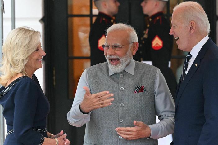 US President Joe Biden and First Lady Jill Biden greet India's Prime Minister Narendra Modi as he arrives at the South Portico of the White House in Washington, DC.