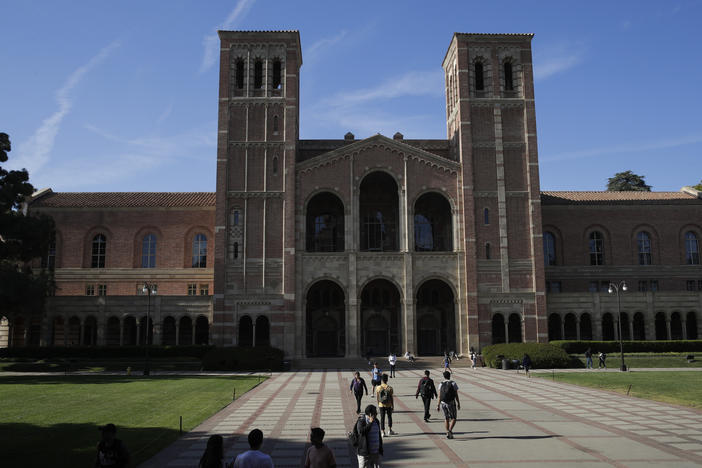 University at California Los Angeles is just starting to catch up to the diversity numbers it saw before an affirmative action ban took effect in 1998, according to a university official. Students walk past Royce Hall at the UCLA campus.