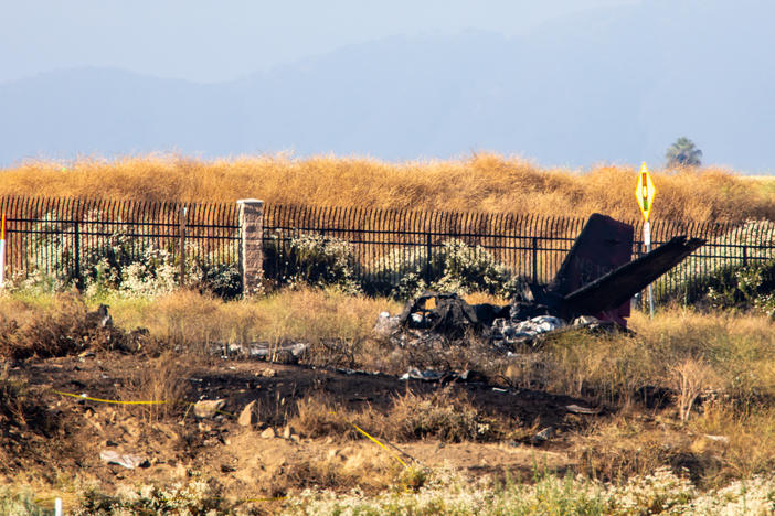 A business jet crashed into a field on Saturday morning, killing six people aboard, Riverside County authorities said. Charred remains of the Cessna C550 lies near the landing approach at French Valley Airport, in Murrieta, Calif.