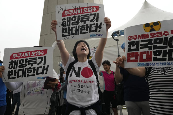 Protesters stage a rally against Japanese government's plan to release treated radioactive water from Fukushima nuclear power plant, at the National Assembly in Seoul, South Korea, on Sunday, July 9, 2023.