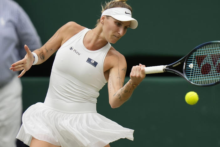 Czech Republic's Marketa Vondrousova in action against Tunisia's Ons Jabeur during the Wimbledon women's singles final in London on Saturday. Vondrousova became the lowest-ranked woman to win the tournament.