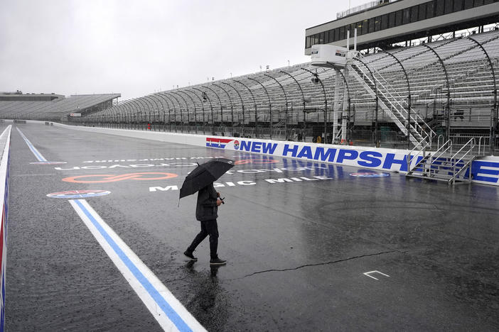 The Crayon 301 NASCAR Cup Series race at New Hampshire Motor Speedway in Loudon (pictured) was canceled Sunday and postponed until Monday due to inclement weather.