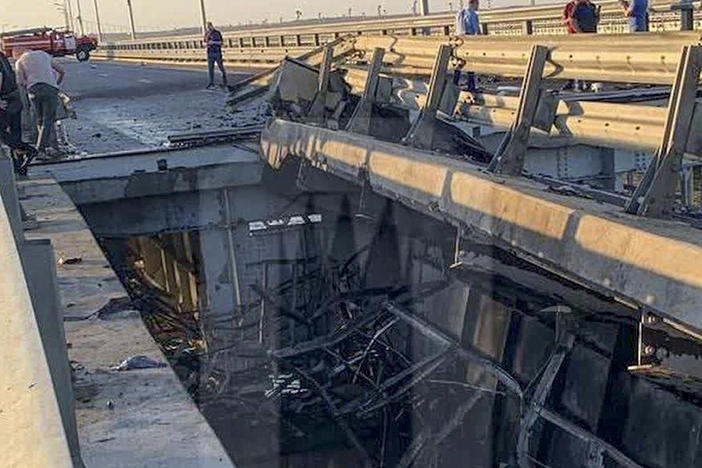This photo released by Ostorozhno Novosti on Monday, July 17, 2023, reportedly shows damaged parts of an automobile link of the Crimean Bridge connecting Russian mainland and Crimean peninsula over the Kerch Strait not far from Kerch, Crimea.