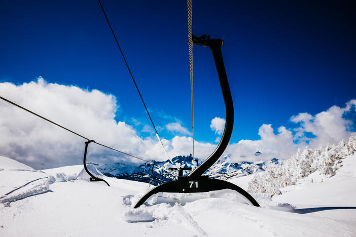 A nearly buried chair on a lift at Mammoth Mountain in mid-March. The resort had its snowiest winter on record, having recorded over 700 inches at the base area and nearly 900 inches at the mountain's summit.