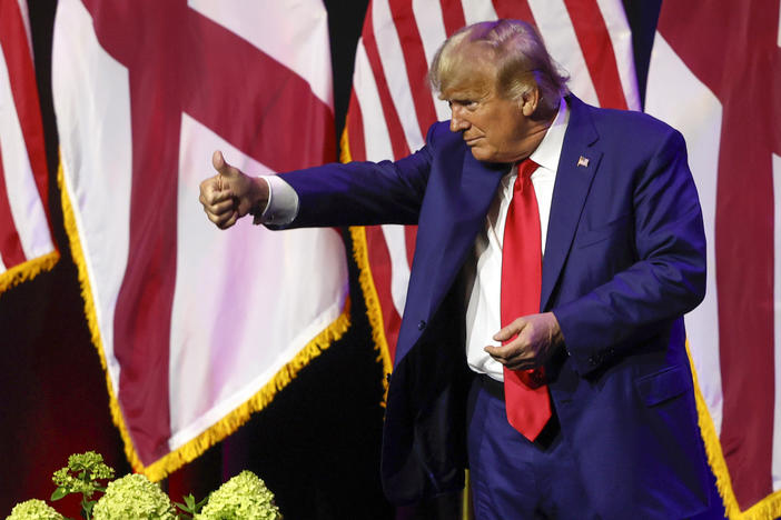 Former President Donald Trump gestures after speaking at a fundraiser event for the Alabama GOP on Friday.