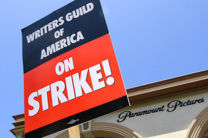 Screenwriters on strike protest in front of Paramount Studios on May 2, 2023 in Los Angeles, California.