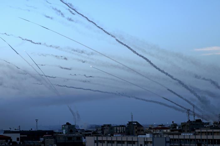 Rockets are fired from Gaza City toward Israel on Oct. 7, 2023.
