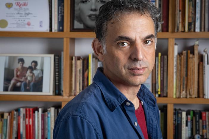 Etgar Keret says writing both protects him from reality and can create the bridge to reality.