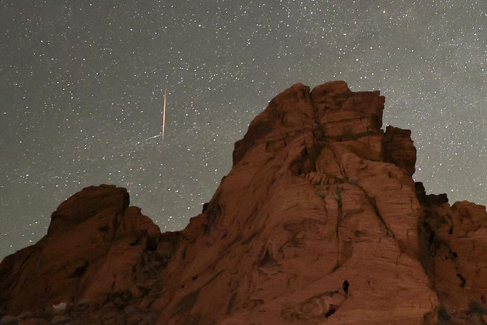 A meteor from the Tau Herculids meteor shower passes over Valley of Fire State Park in Nevada on May 30, 2022. A meteor shower known for producing fireballs, the Southern Taurids, is expected to peak this week.