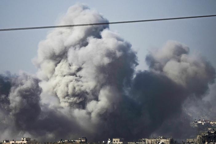 This picture taken from southern Israel near the border with the Gaza Strip shows smoke billowing after an Israeli strike on northern Gaza on Thursday amid ongoing battles between Israel and the Palestinian Hamas movement.
