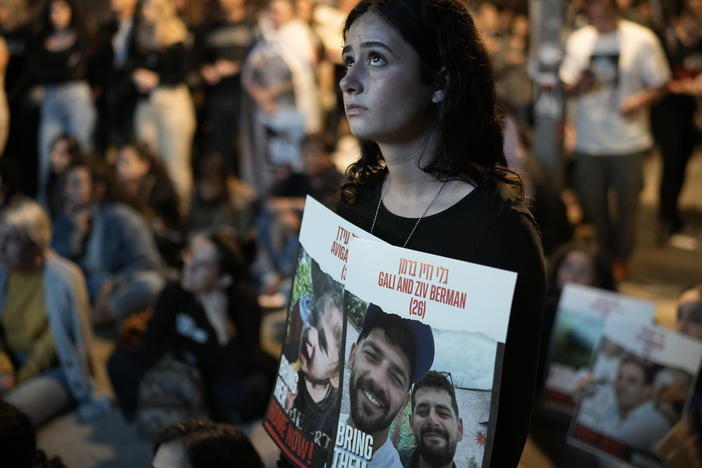 People participate in a show of solidarity with hostages being held in the Gaza Strip, at "hostages square" in Tel Aviv, Israel, on Saturday.